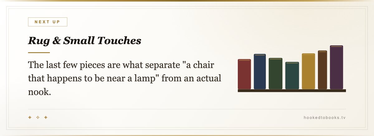 Rug & Small Touches — The last few pieces are what separate "a chair that happens to be near a lamp" from an actual nook.